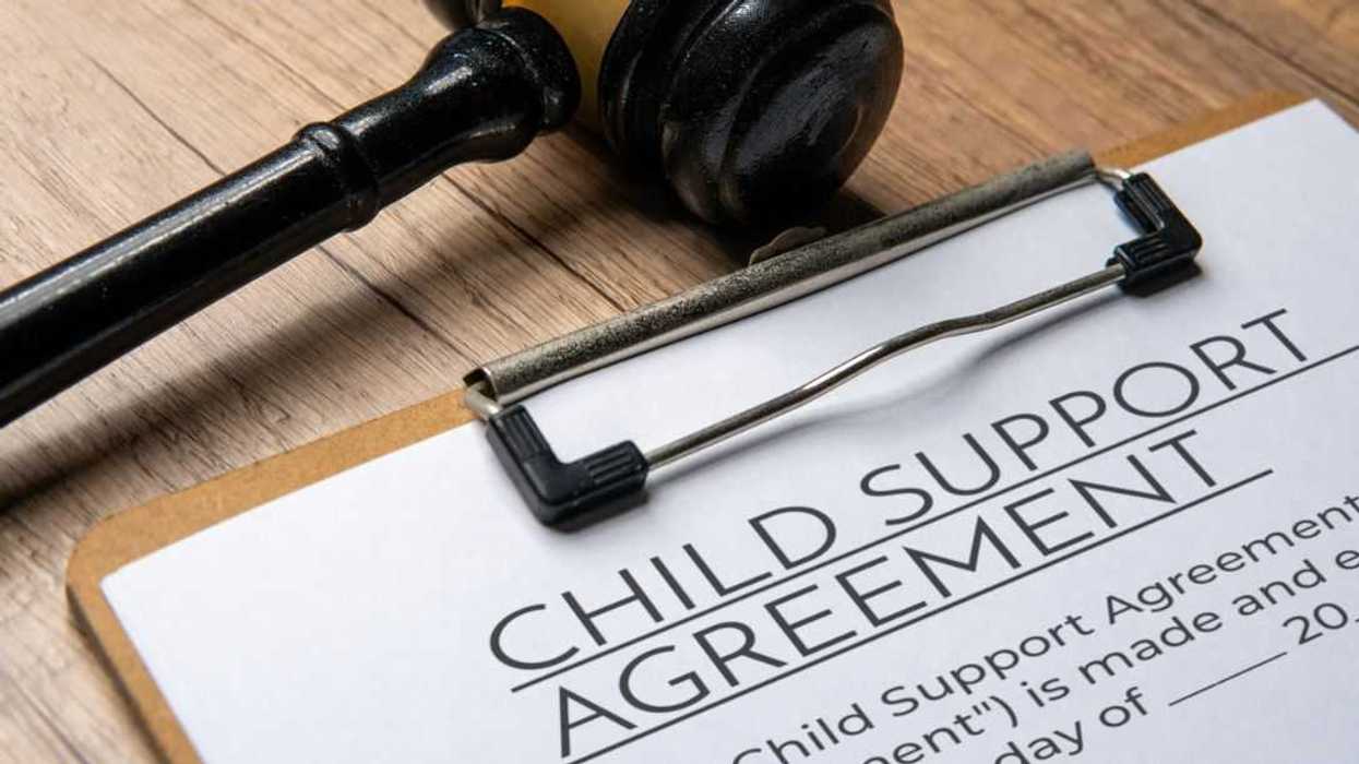 A gavel on a child support agreement document. Legal concept.