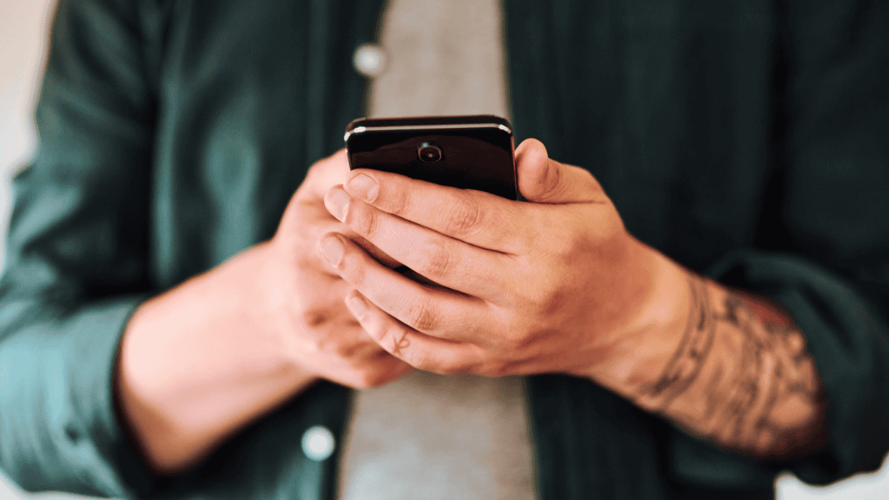 A man holding a cell phone.