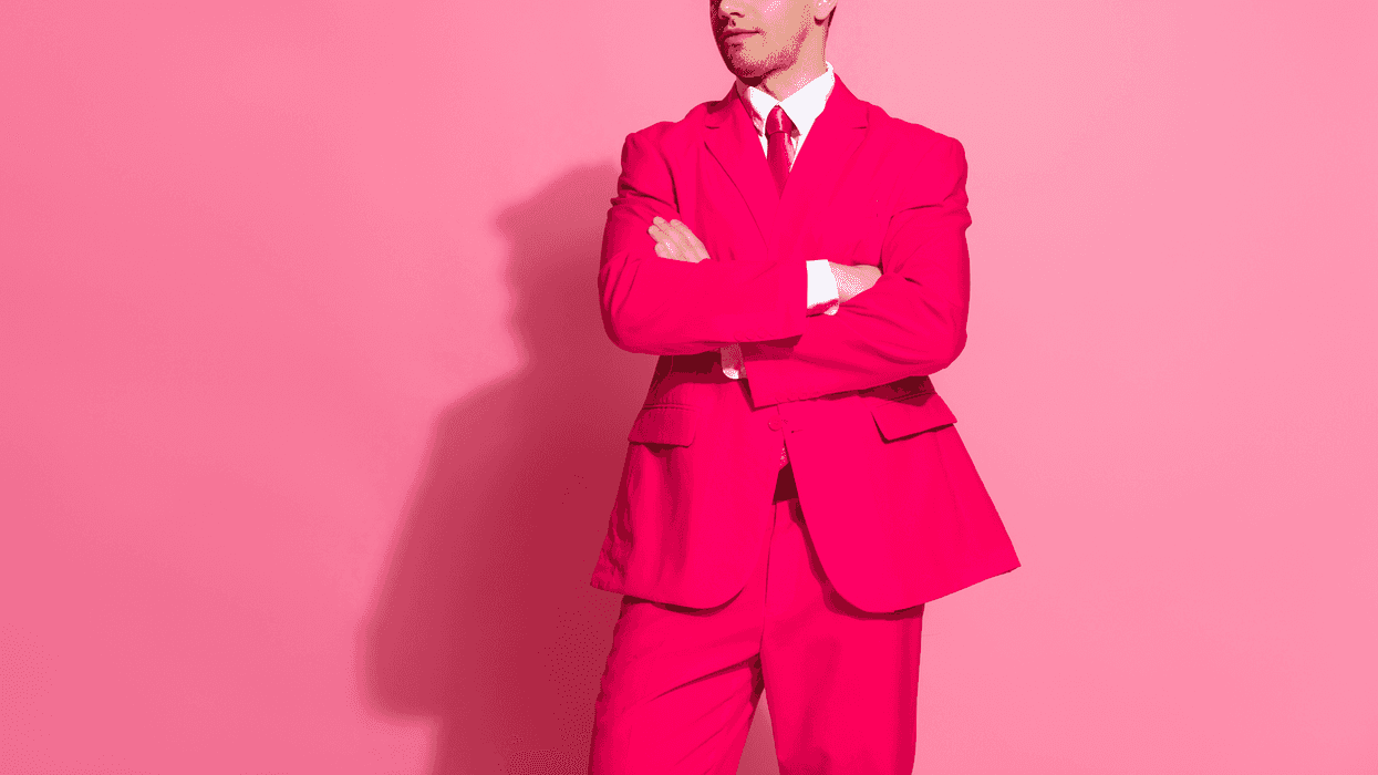 A man in a pink suit.