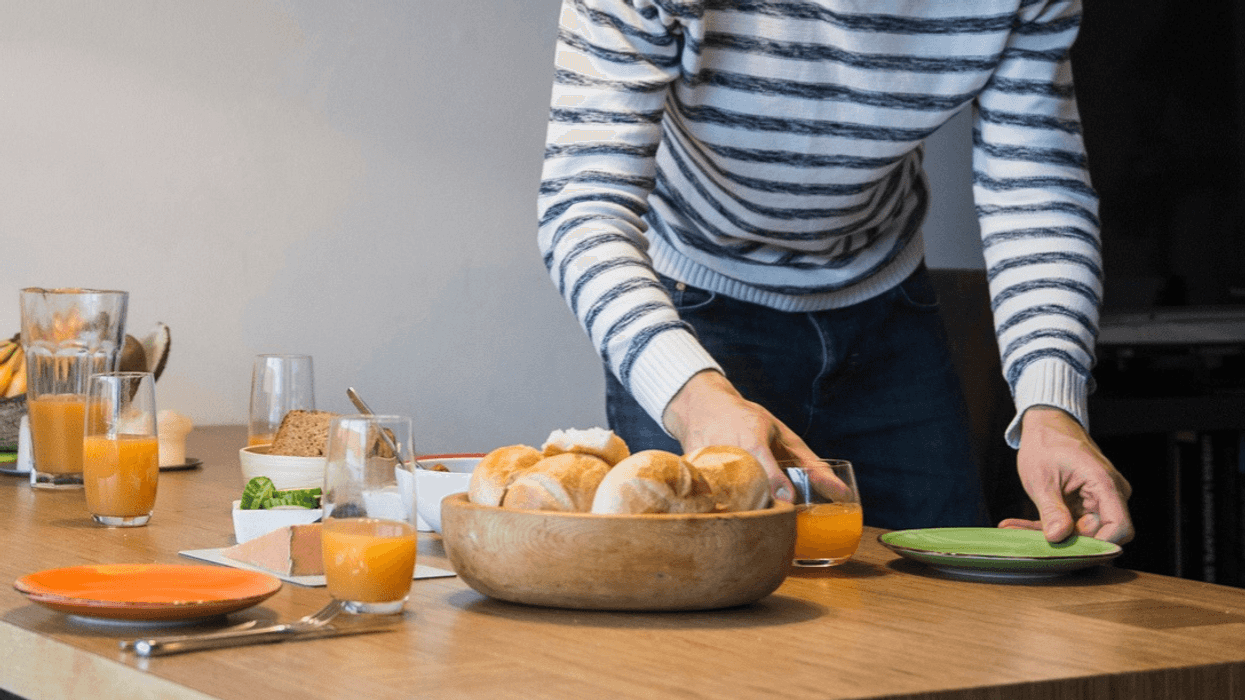 A person setting their dinner table