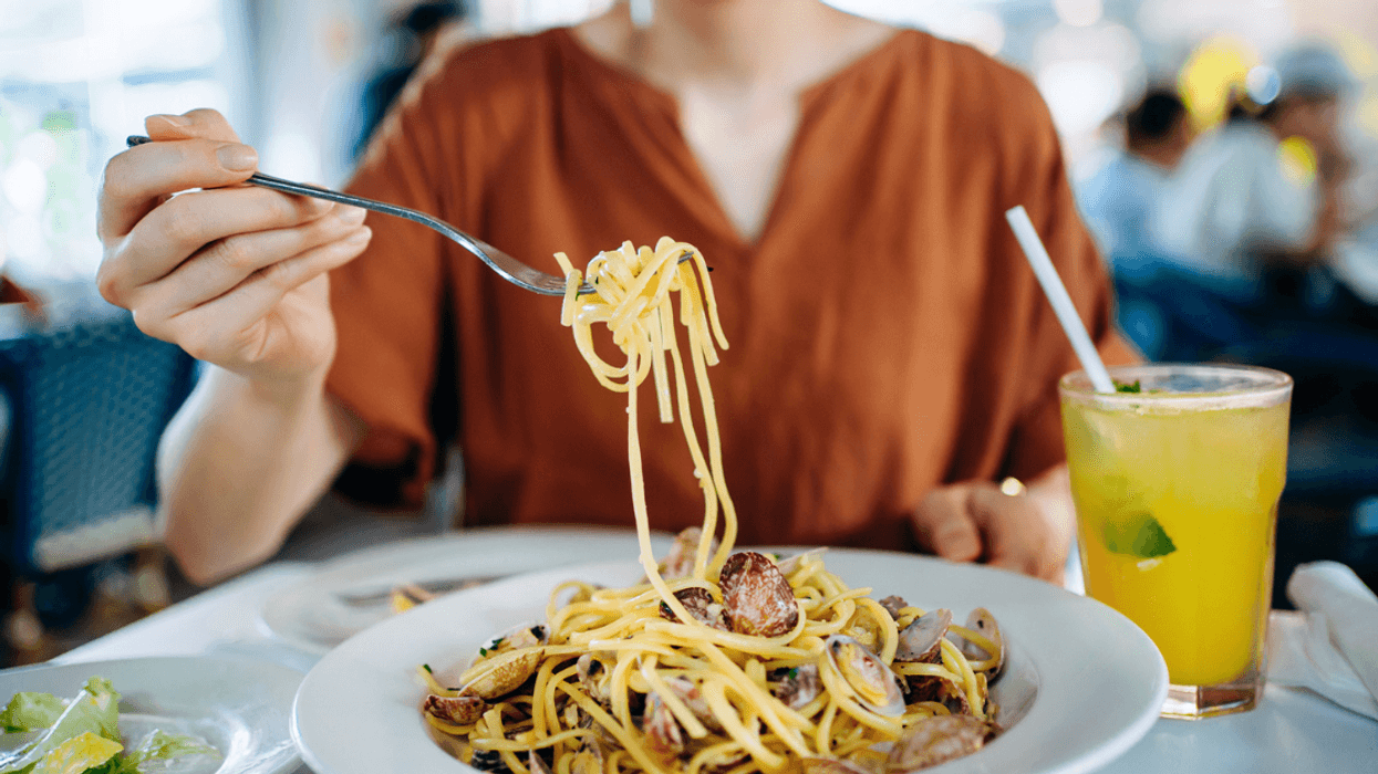 A woman eating a meal