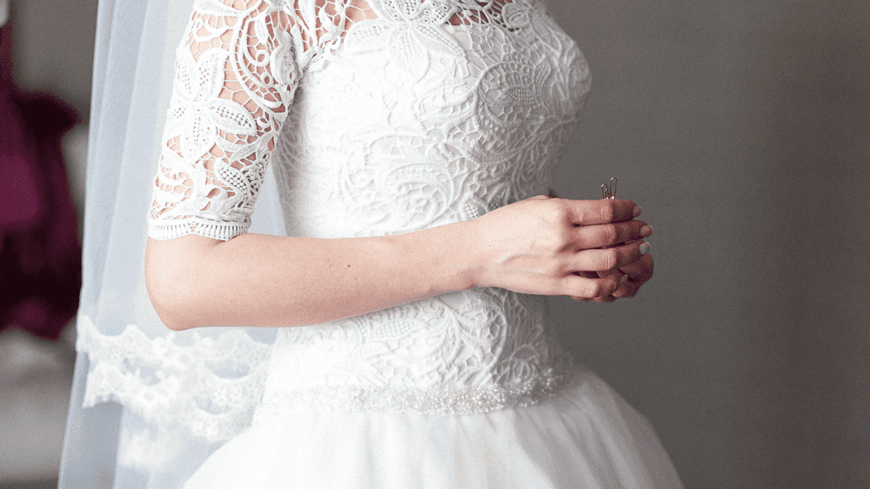 A woman in a bridal gown.