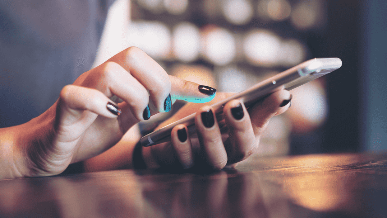 A woman on her cell phone.