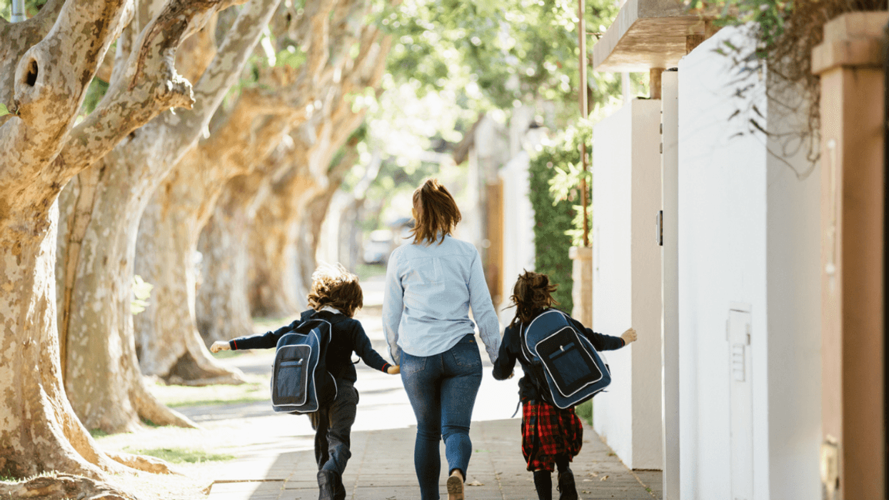 A woman walking down the street.