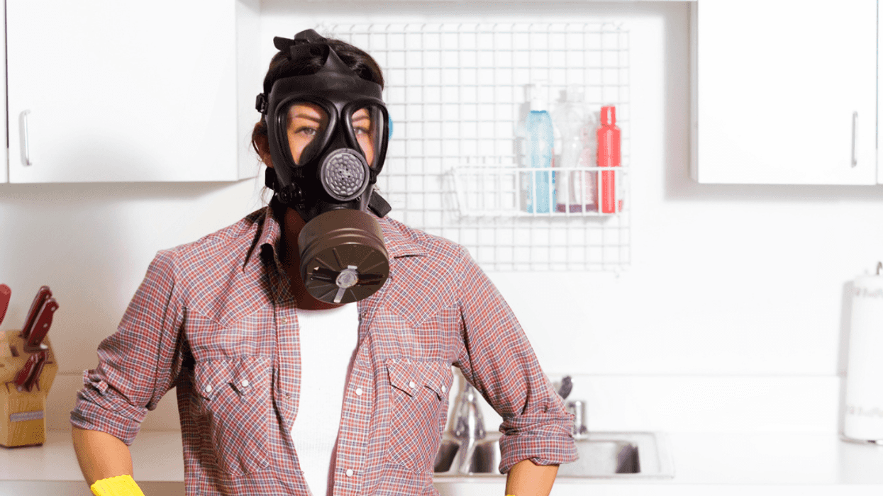 A woman wearing a gas mask.