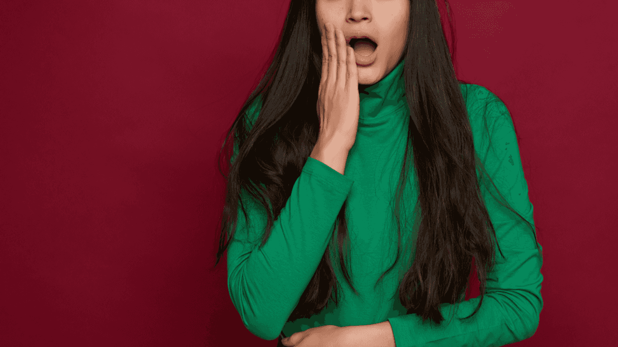 A woman with a shocked expression on her face.