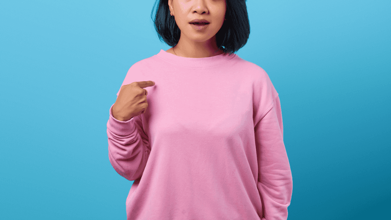 A woman with a stunned expression on her face.