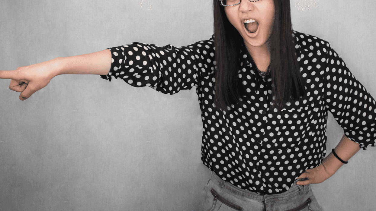 a Woman yelling and pointing her finger.