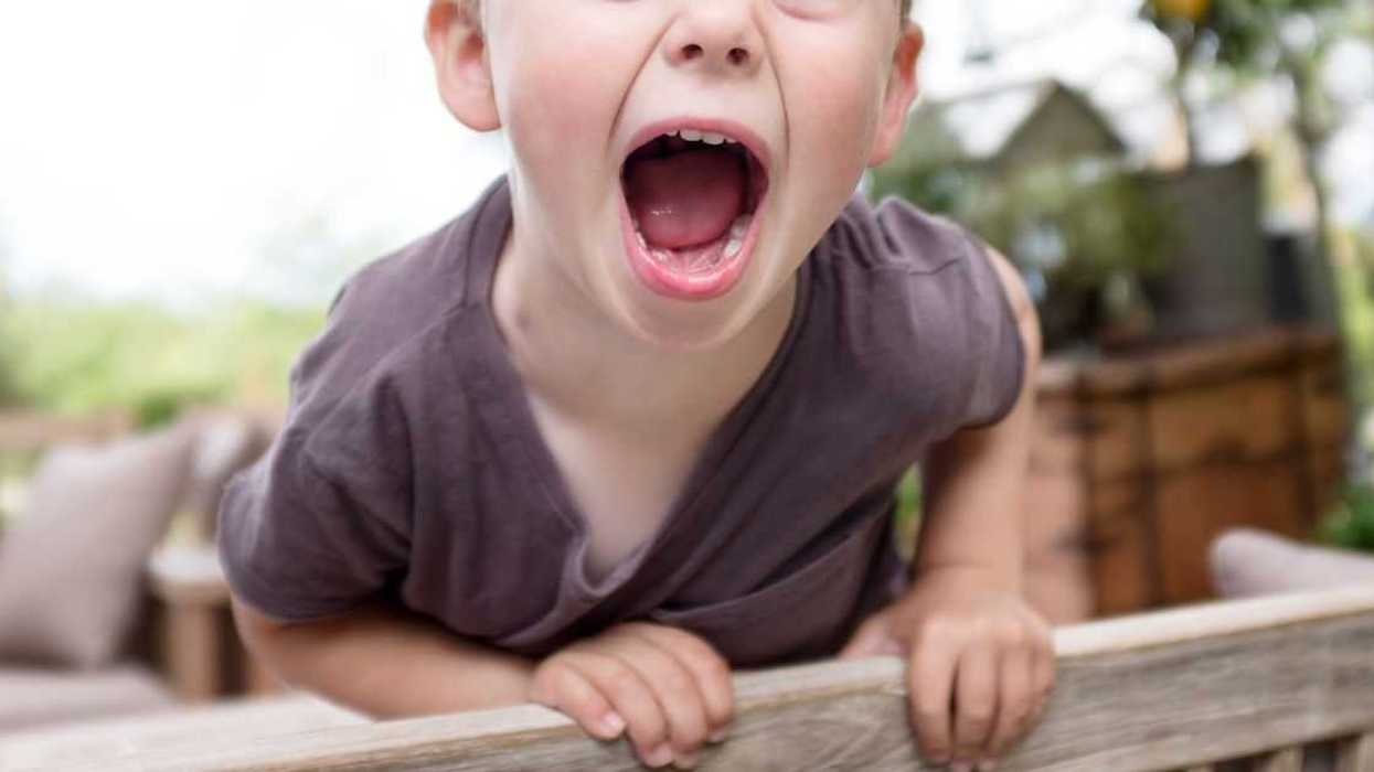 A young man is screaming