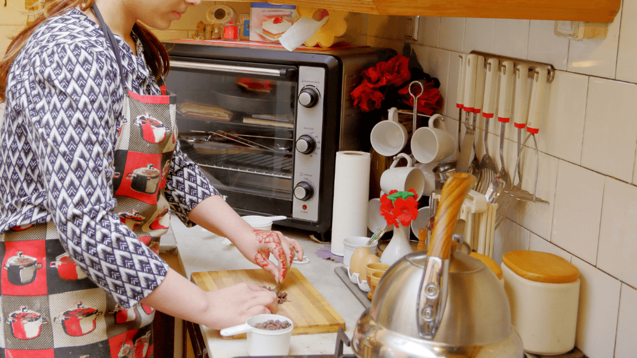 a young woman baking in a kitchen