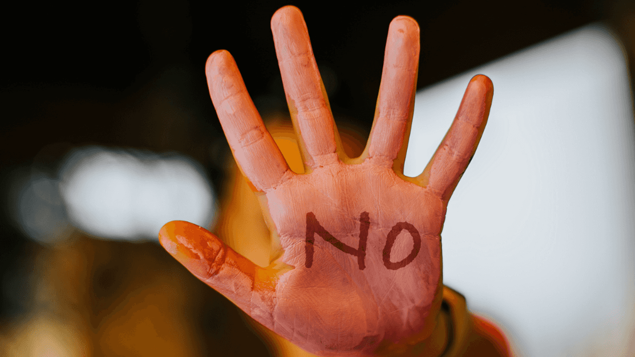 An open palm with the word