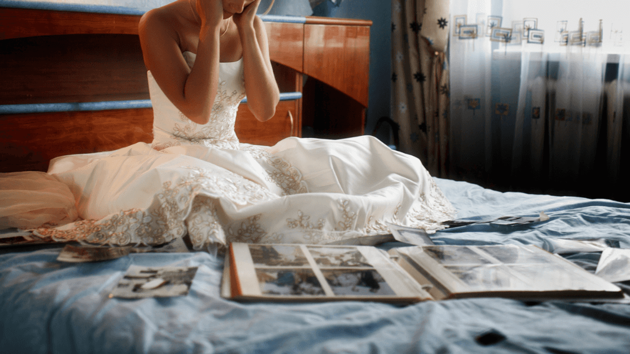 Angry bride looking at a family photos