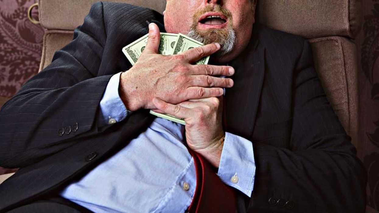 Angry man with money