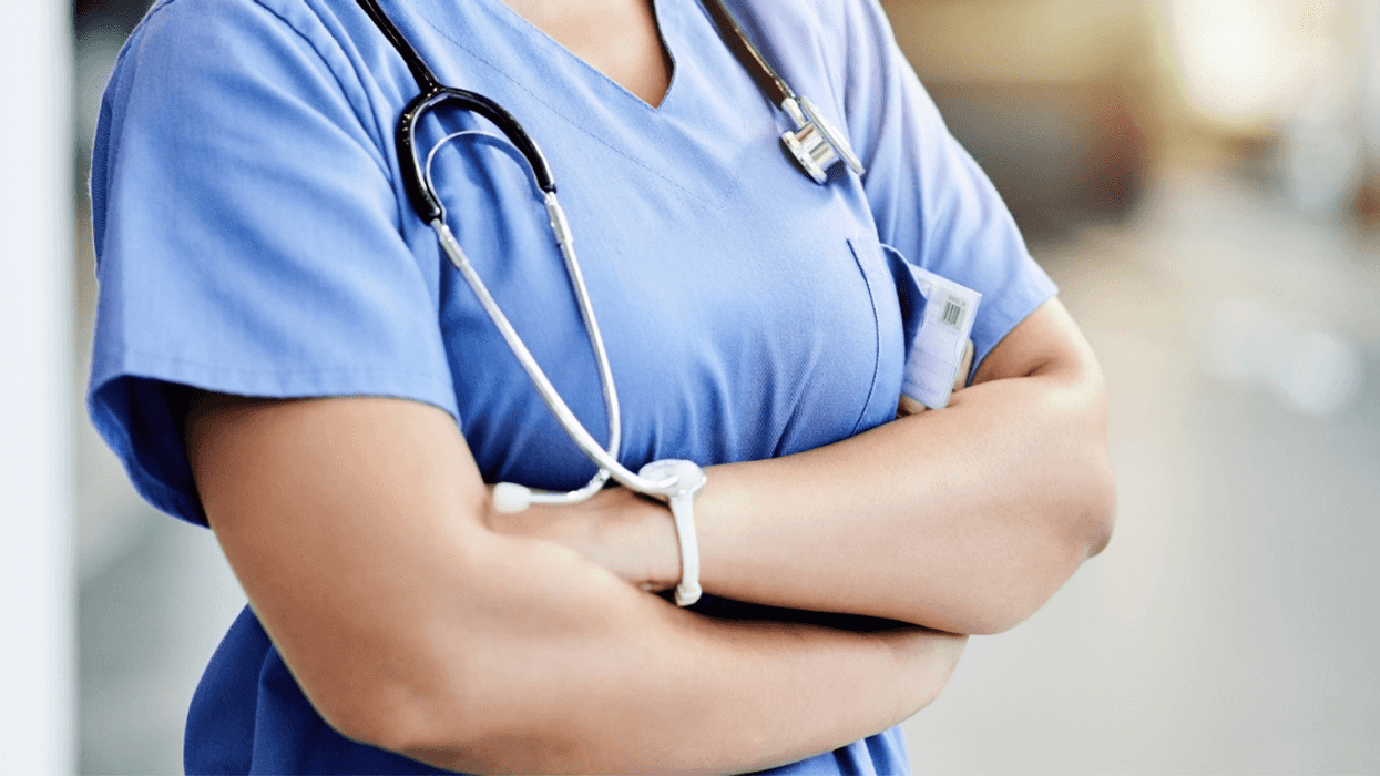 Angry nurse with arms crossed