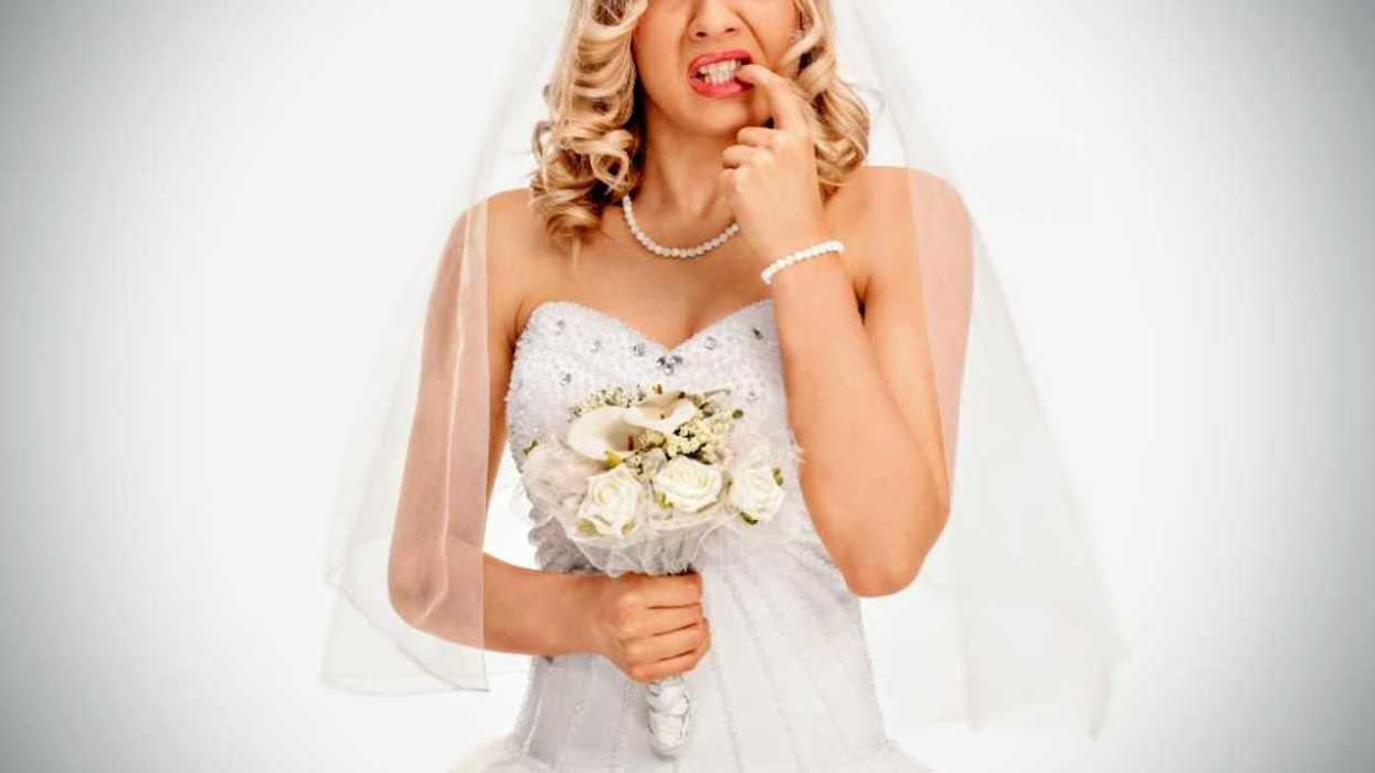 anxious bride biting her finger