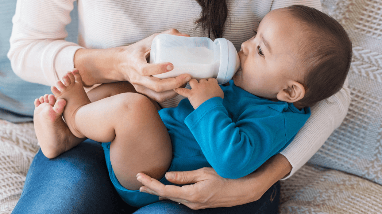 Baby drinking from a bottle