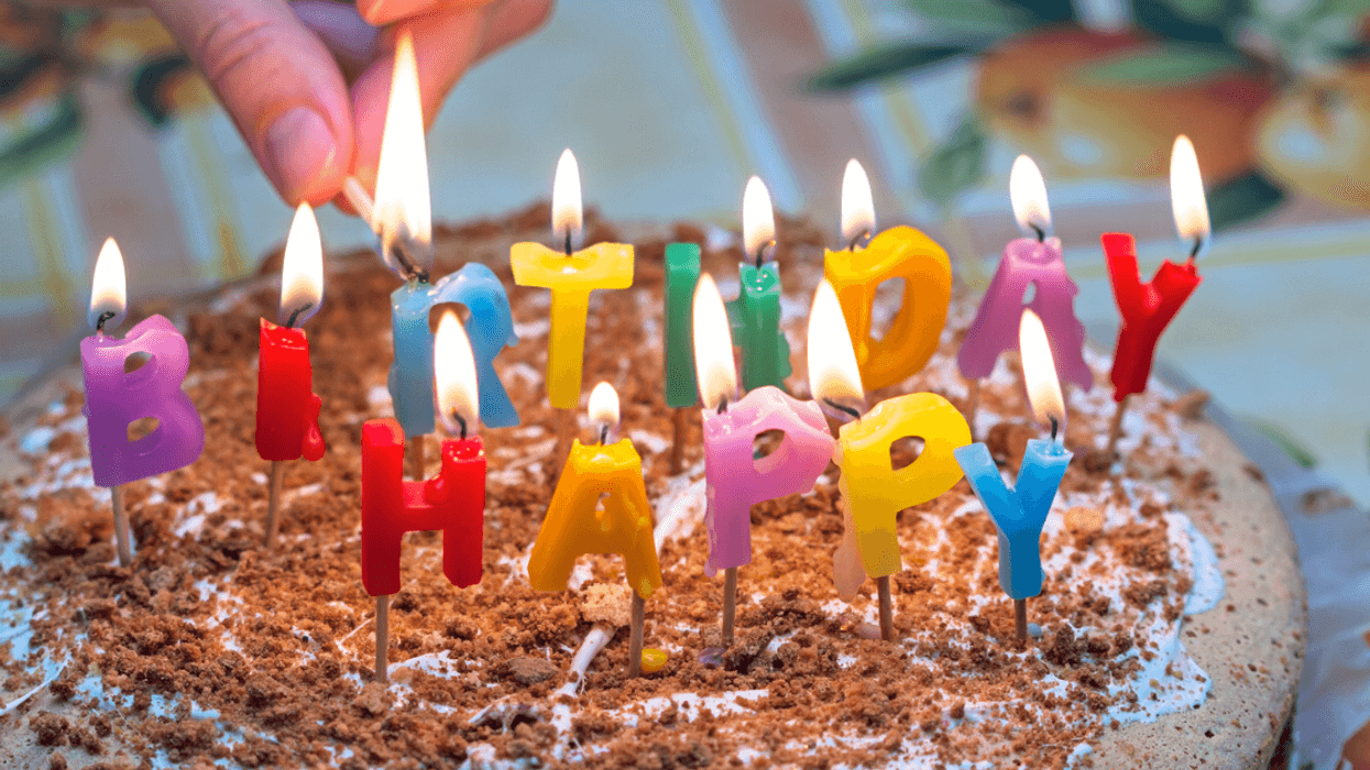 birthday cake with lit candles