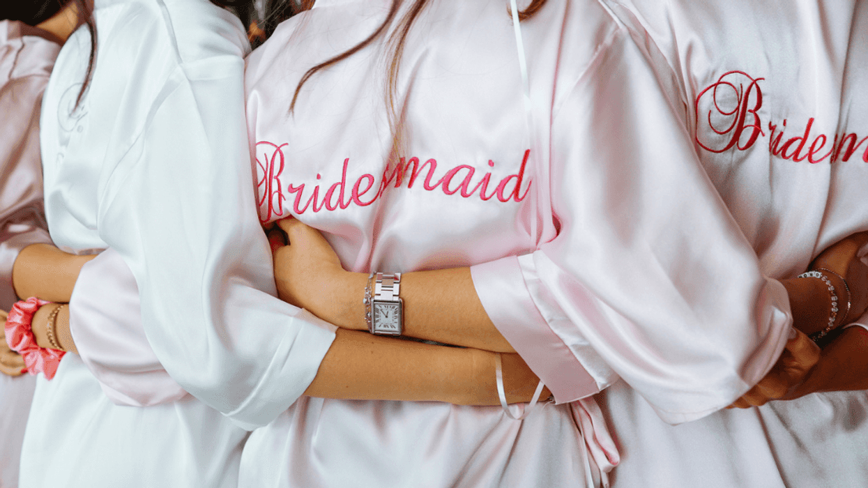 Bride and bridesmaids getting ready for wedding