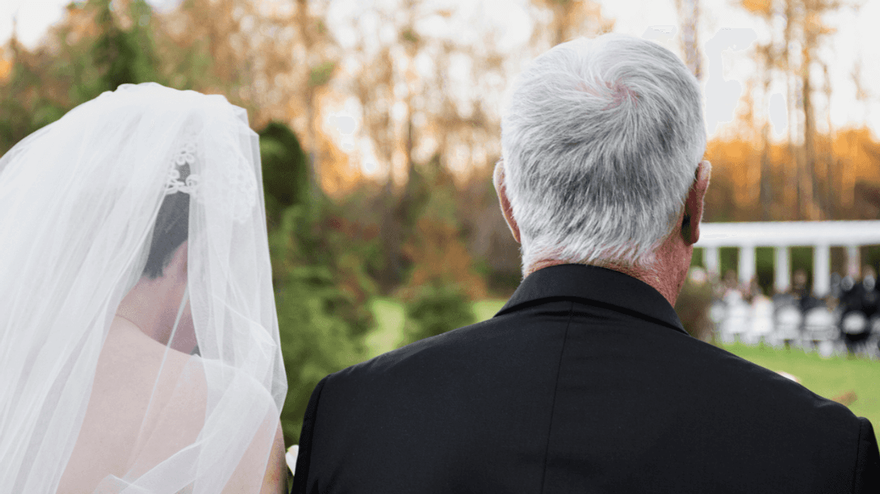 Bride and father walking down the aisle