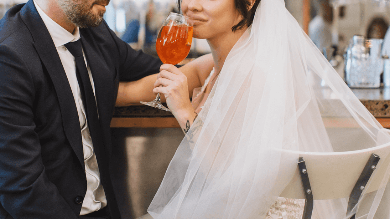 Bride and groom at bar