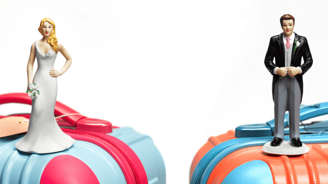 bride and groom cake toppers a top luggage