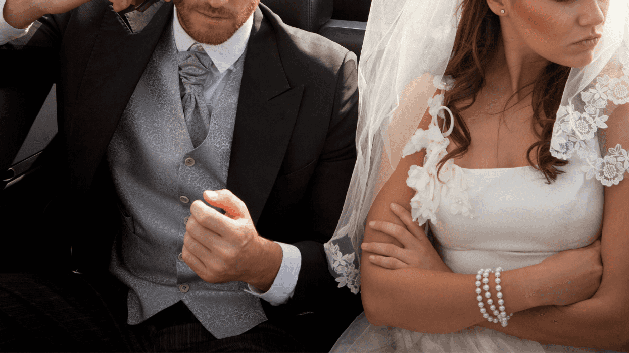 Bride and groom in car
