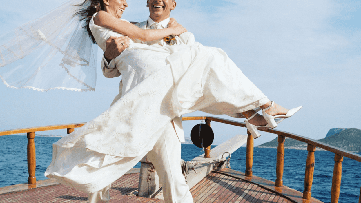 bride and groom on deck of ship