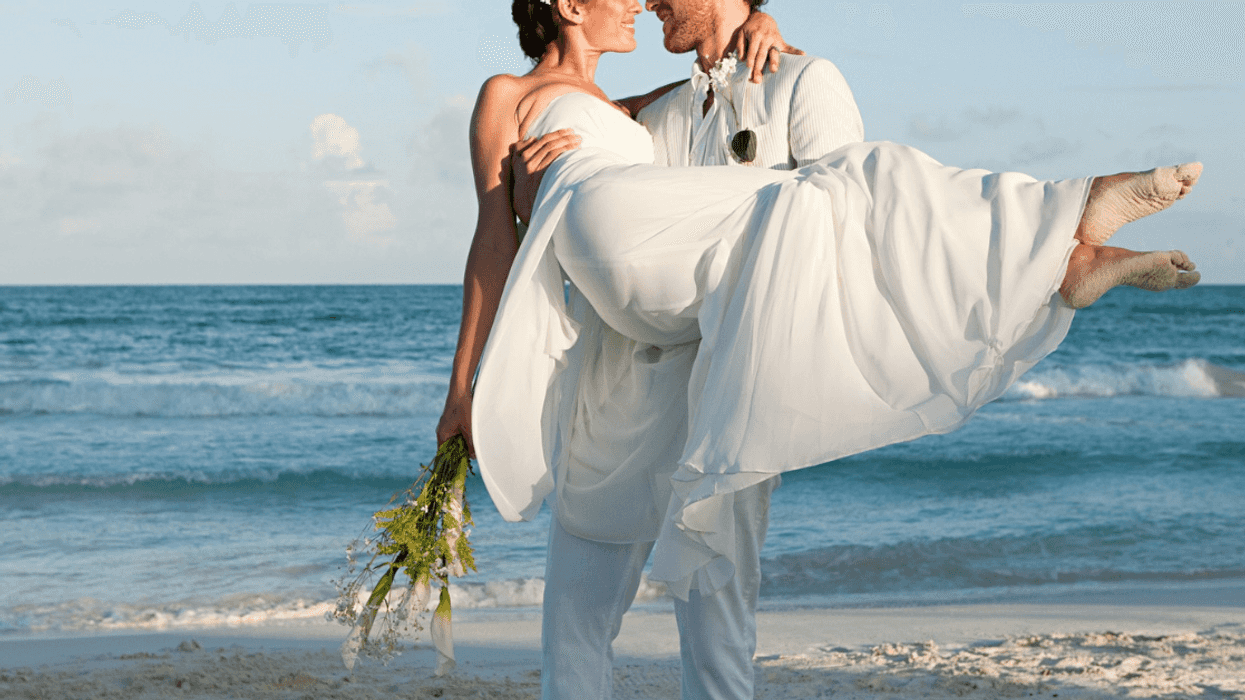 bride and groom on the beach
