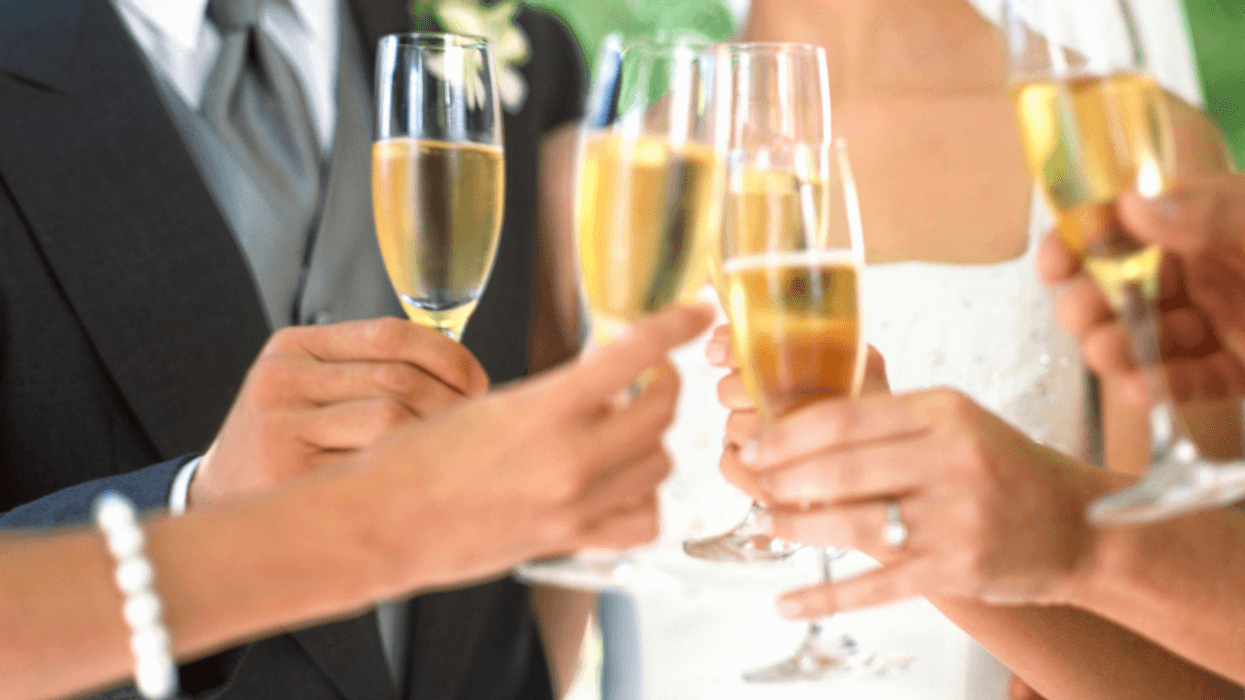 Bride and groom sharing a toast