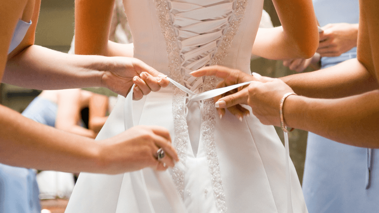 Bride getting dressed