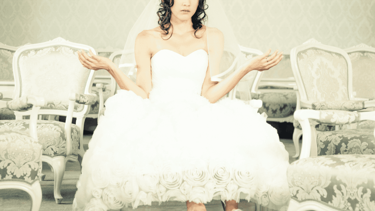 Bride shrugging her shoulders