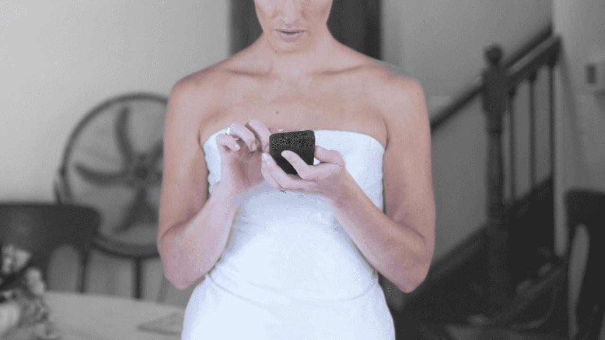 bride texting on phone