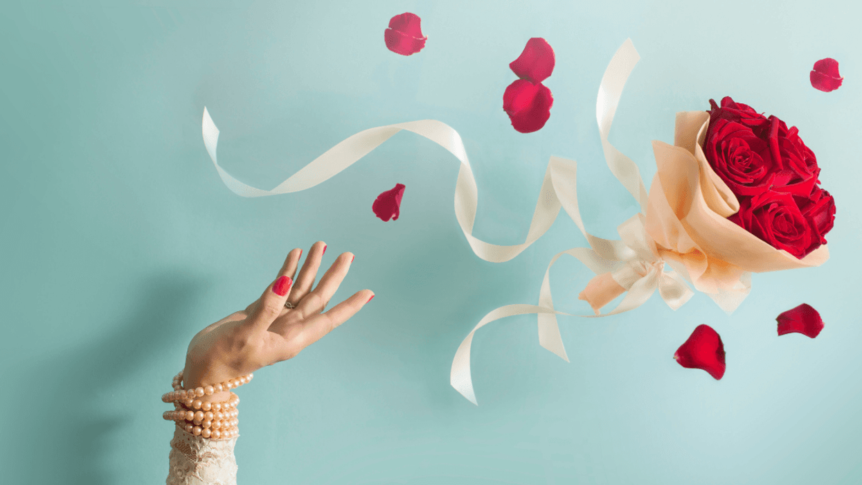 bride tossing bouquet
