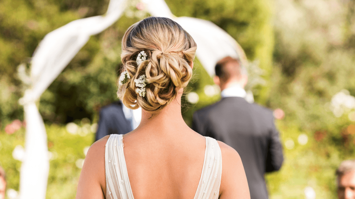 Bride walking down the aisle alone