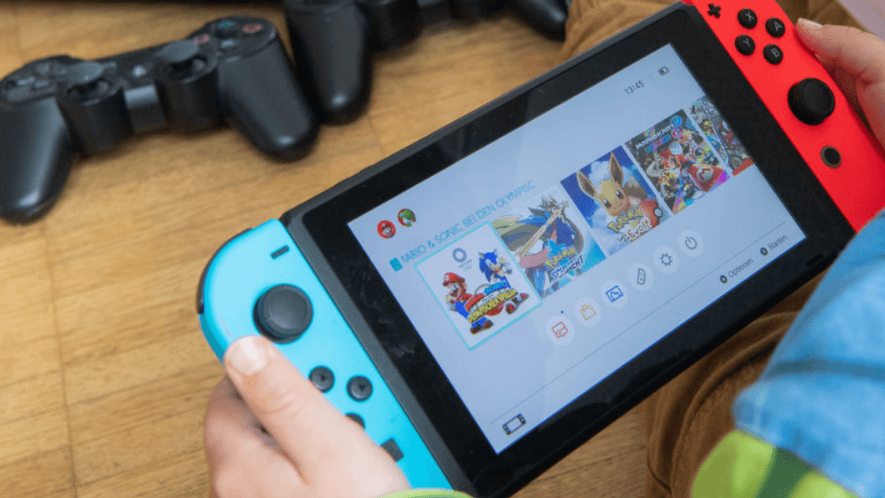 Child holding Nintendo Switch 2