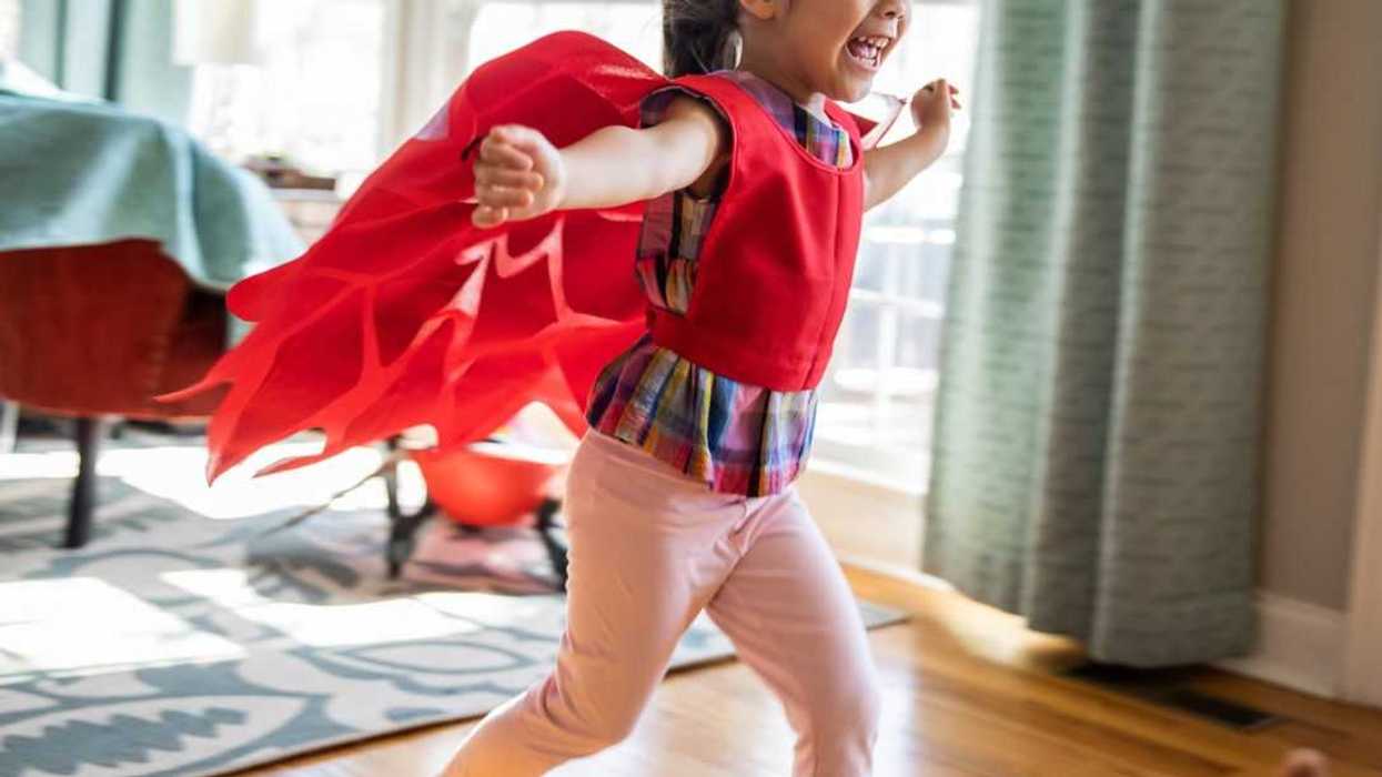 Child playing in homemade costume.