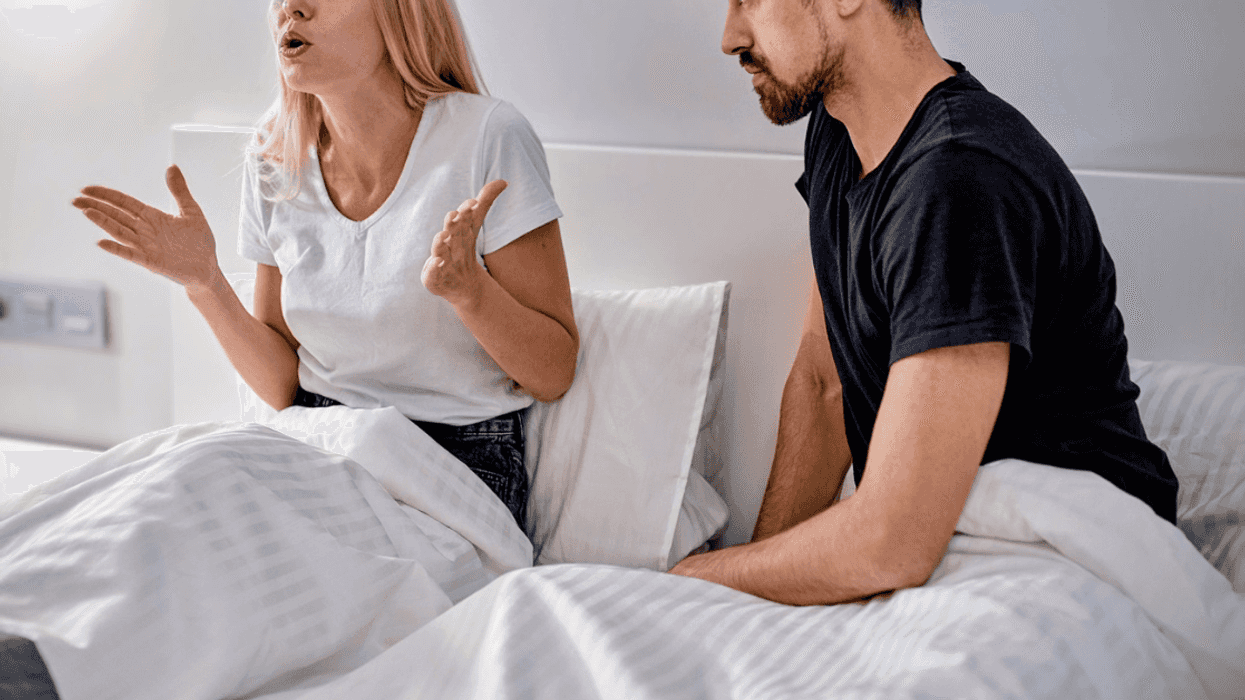 couple argue in bed