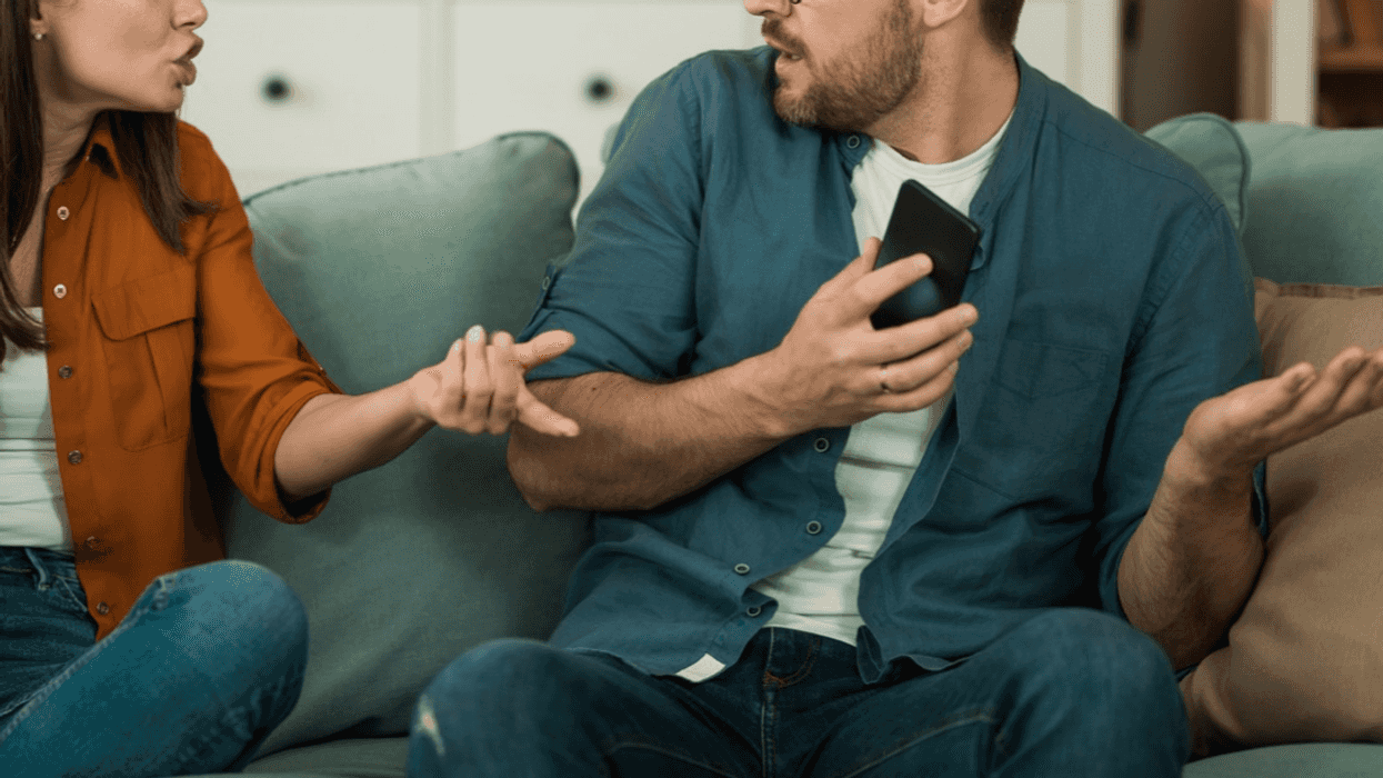 Couple arguing about cell phone