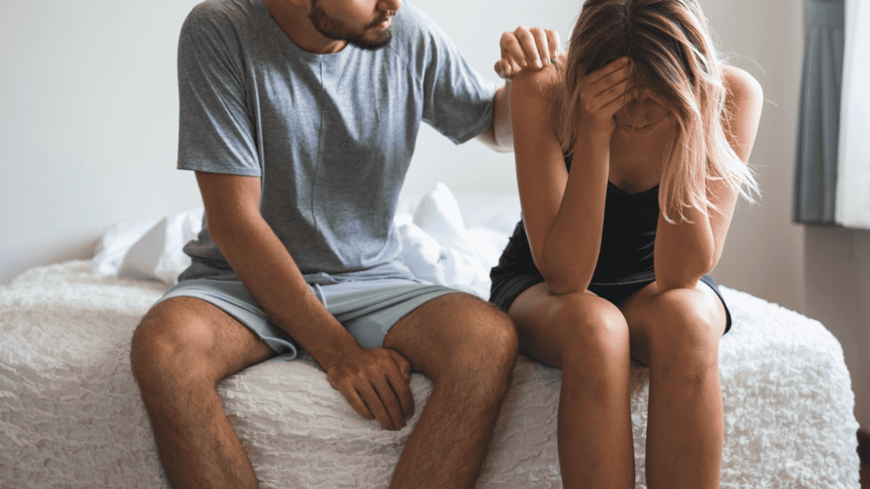 Couple Arguing In Bed
