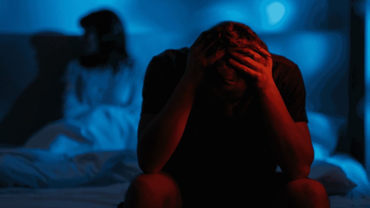 Couple arguing in bed