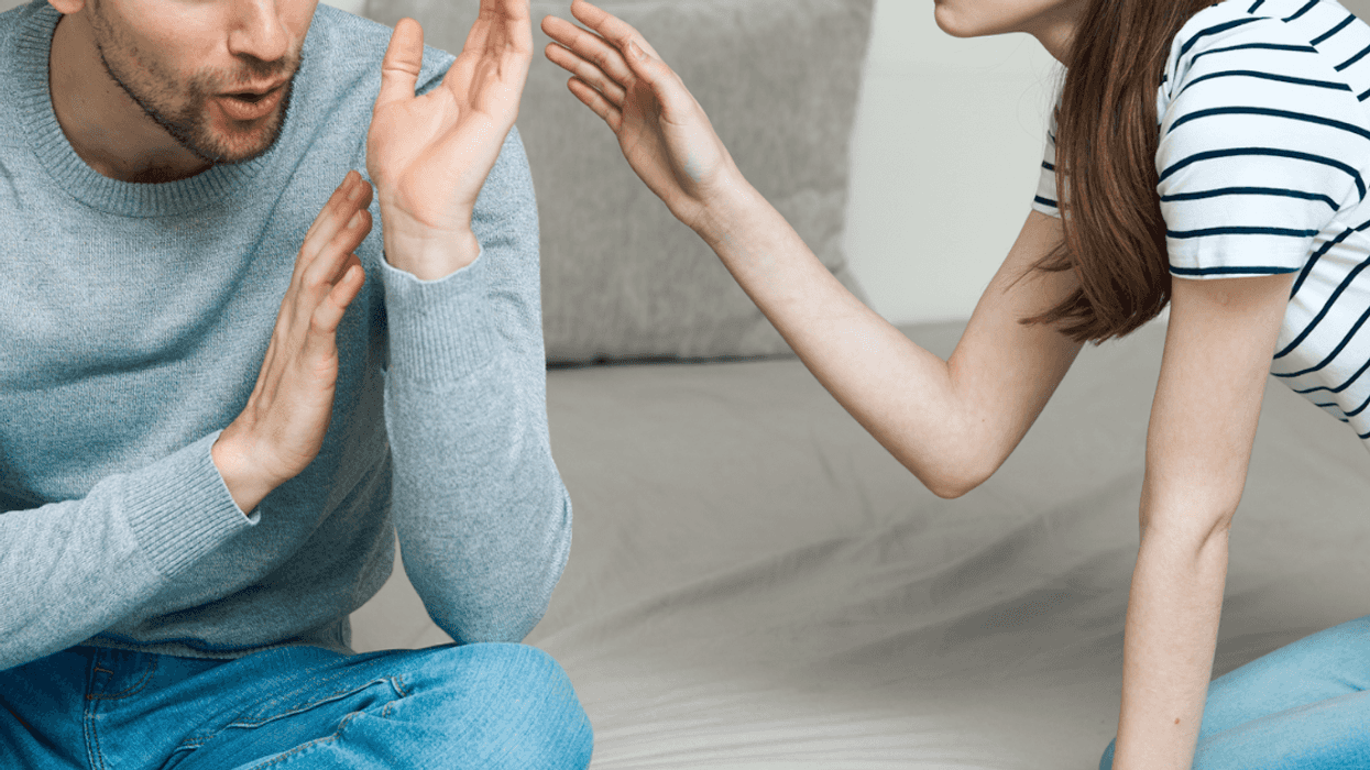 Couple arguing in bedroom
