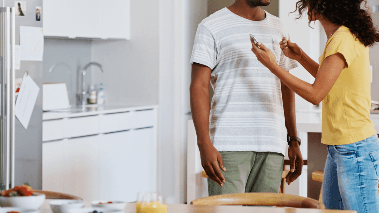 Couple arguing in kitchen