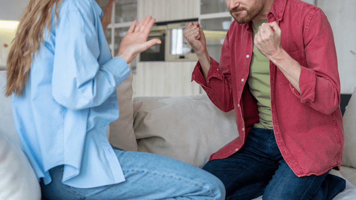 couple arguing on couch