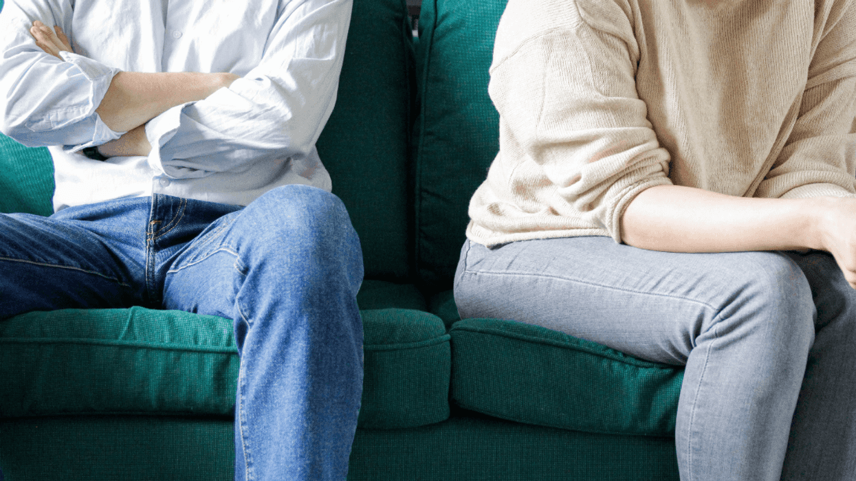 couple arguing on couch
