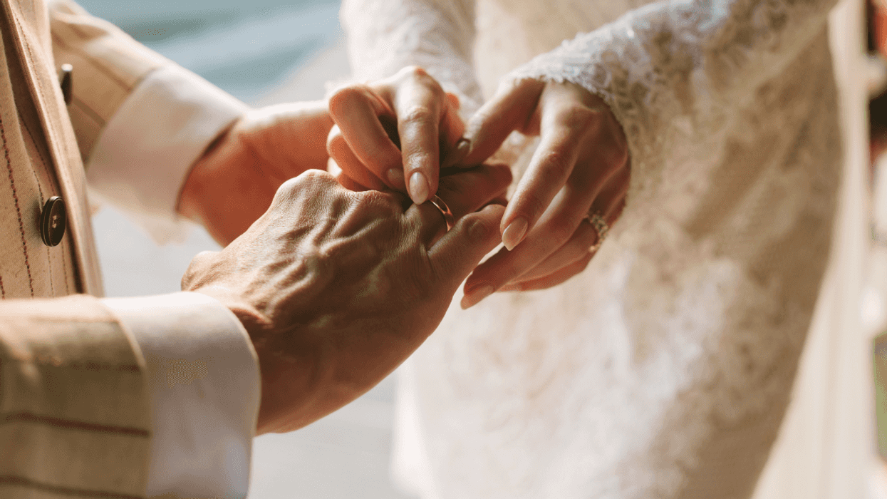 Couple exchanging rings