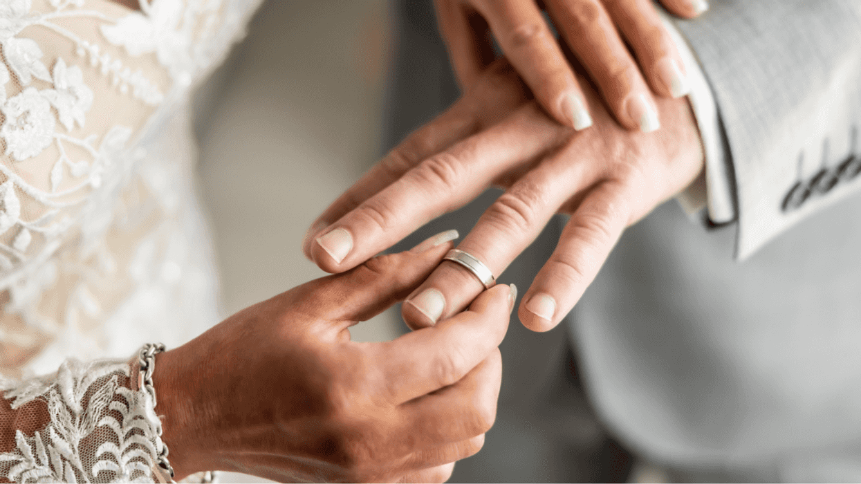 Couple exchanging rings