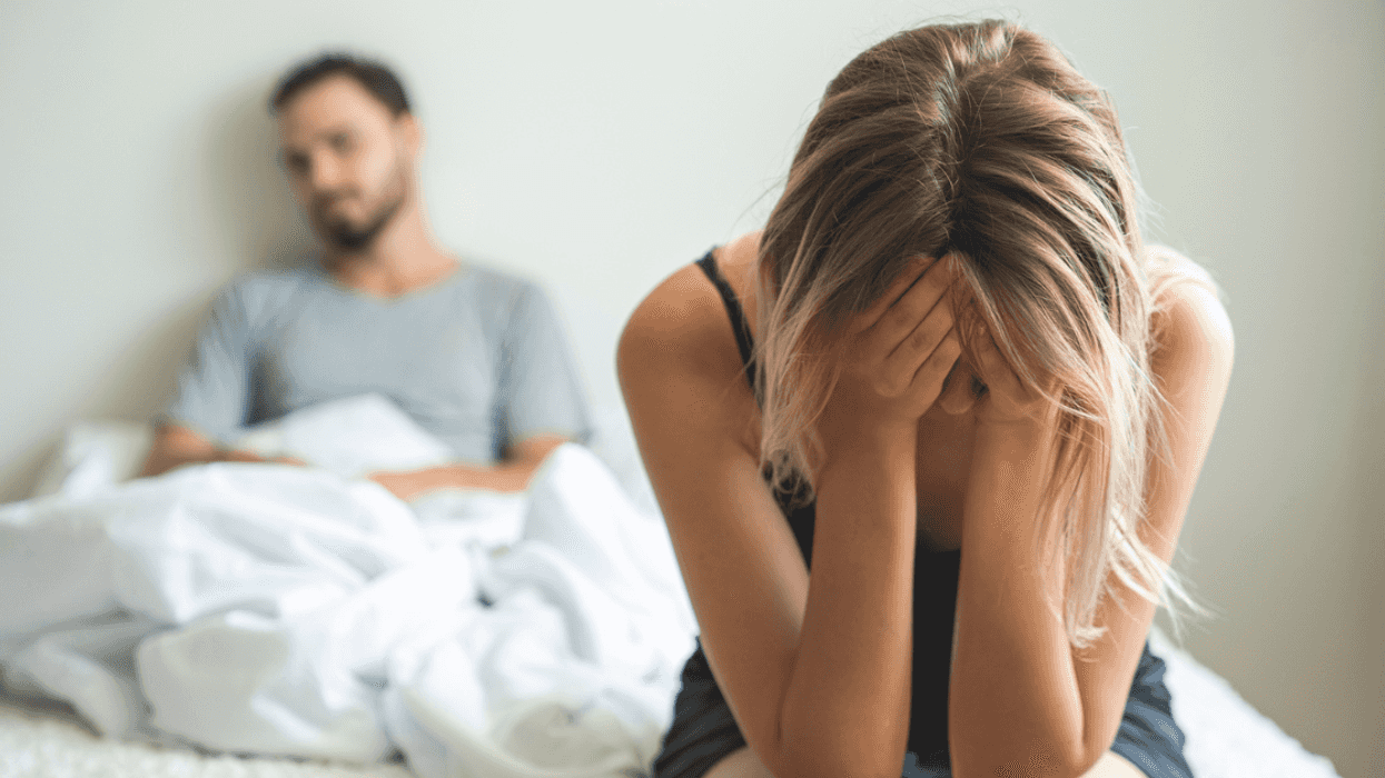 Couple having an argument in bed