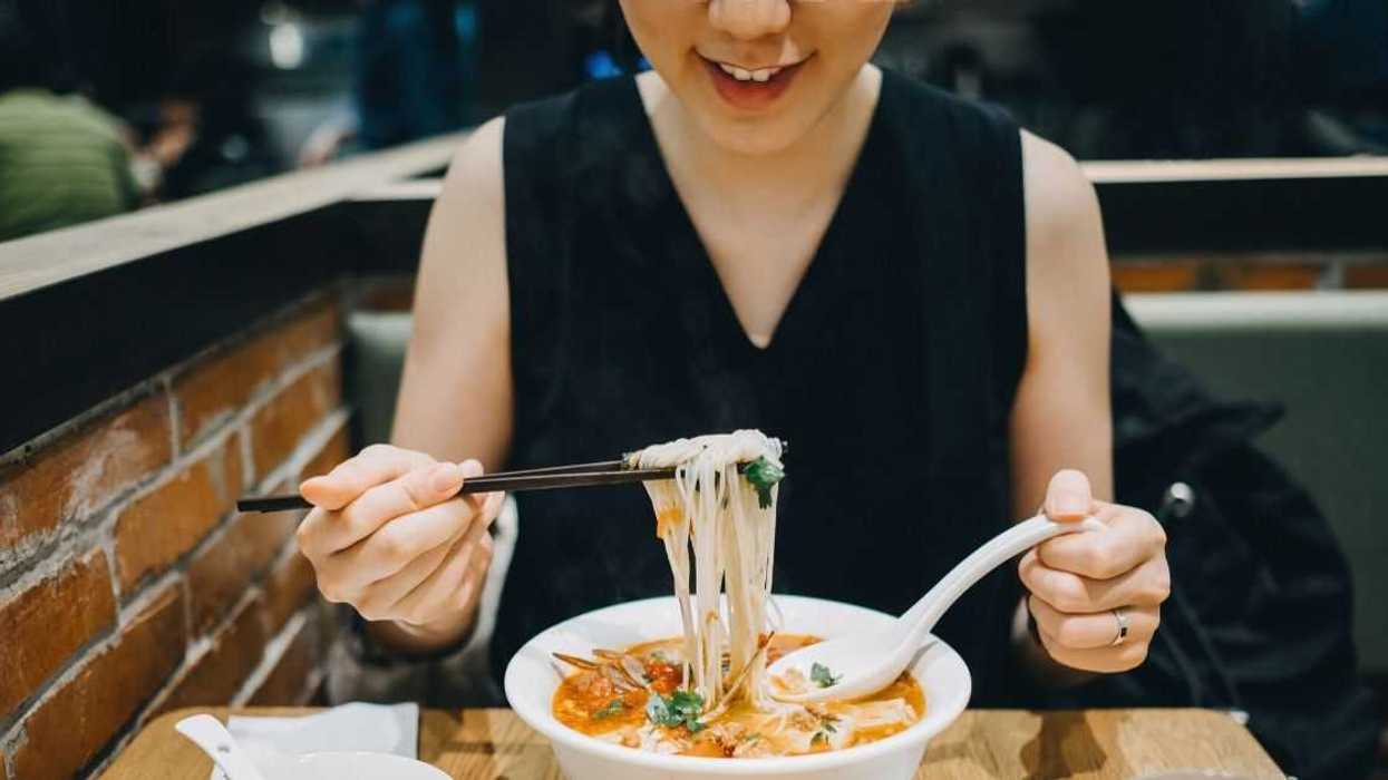 Woman Sparks Drama After Trying To Stop Her Boyfriend From 'Educating' A Chinese Woman About Slurping Her Food