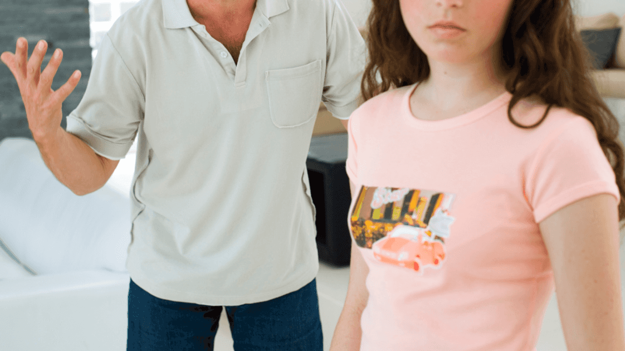 Dad arguing with teen daughter