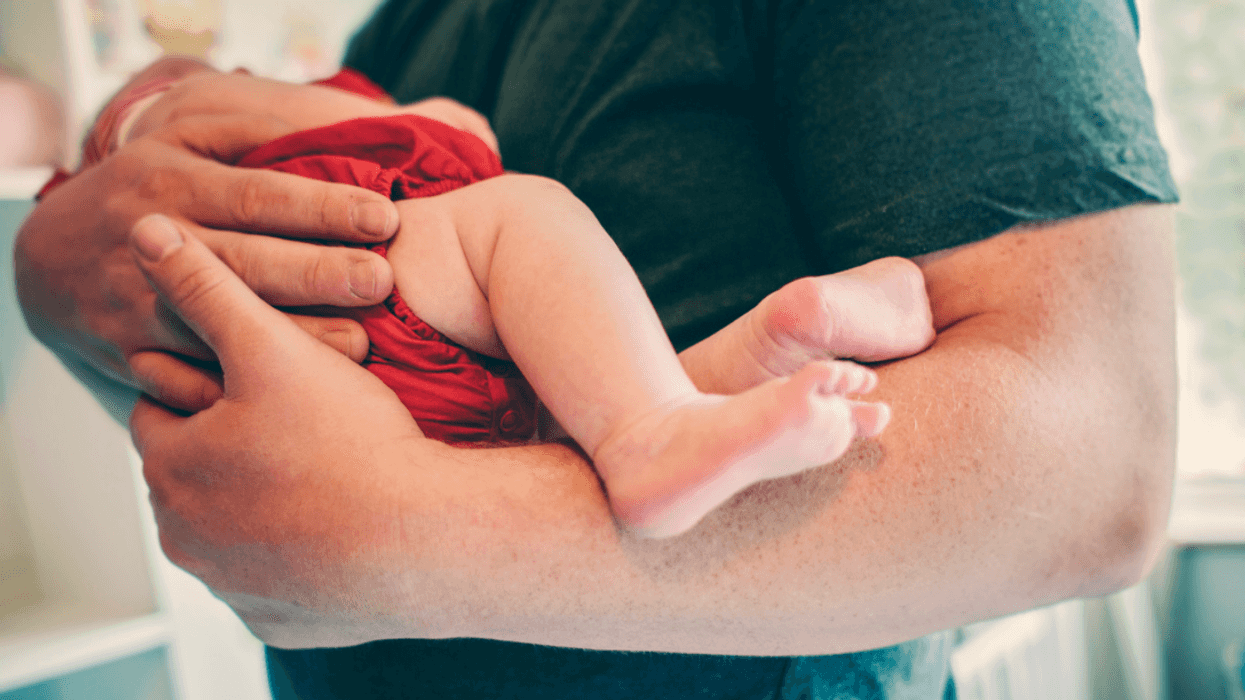 Dad holding baby